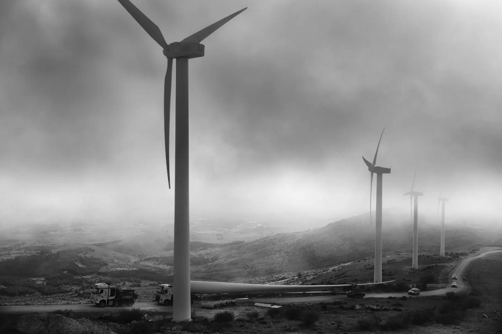 Convoy transporting a wind-turbine blade through the Sierra de Ojos de Albos